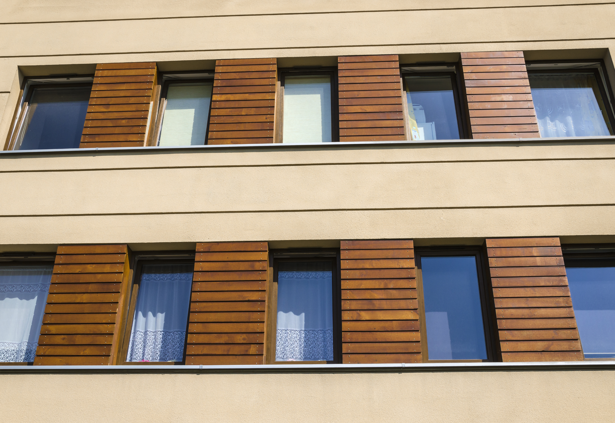 Fasadne plošče imitacija lesa so bile primerne za tip naše hiše